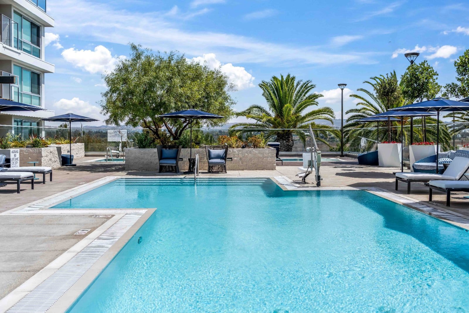 The pool deck at One Uptown Newport, Newport Beach